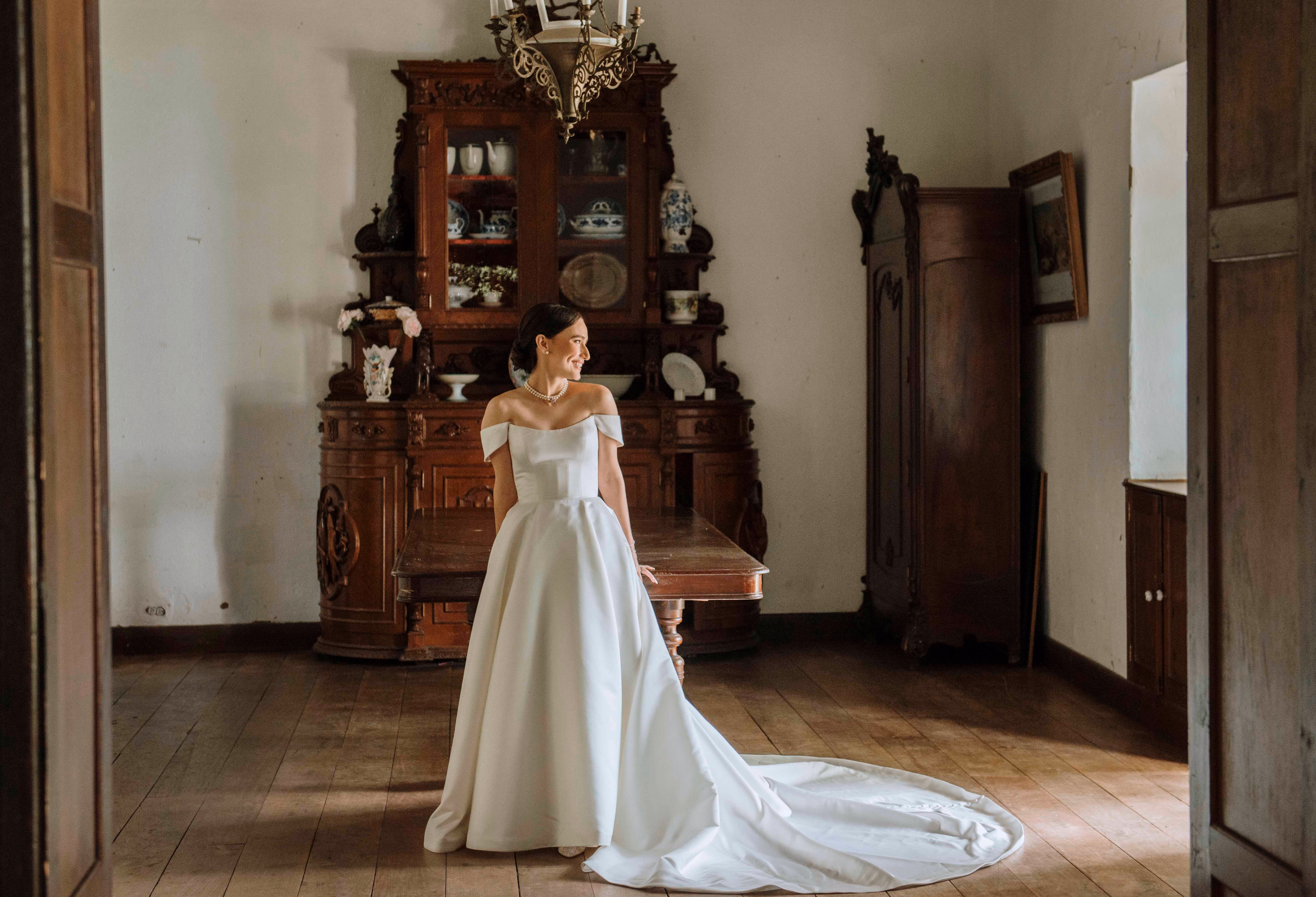 Bride in a historic interior before her ceremony