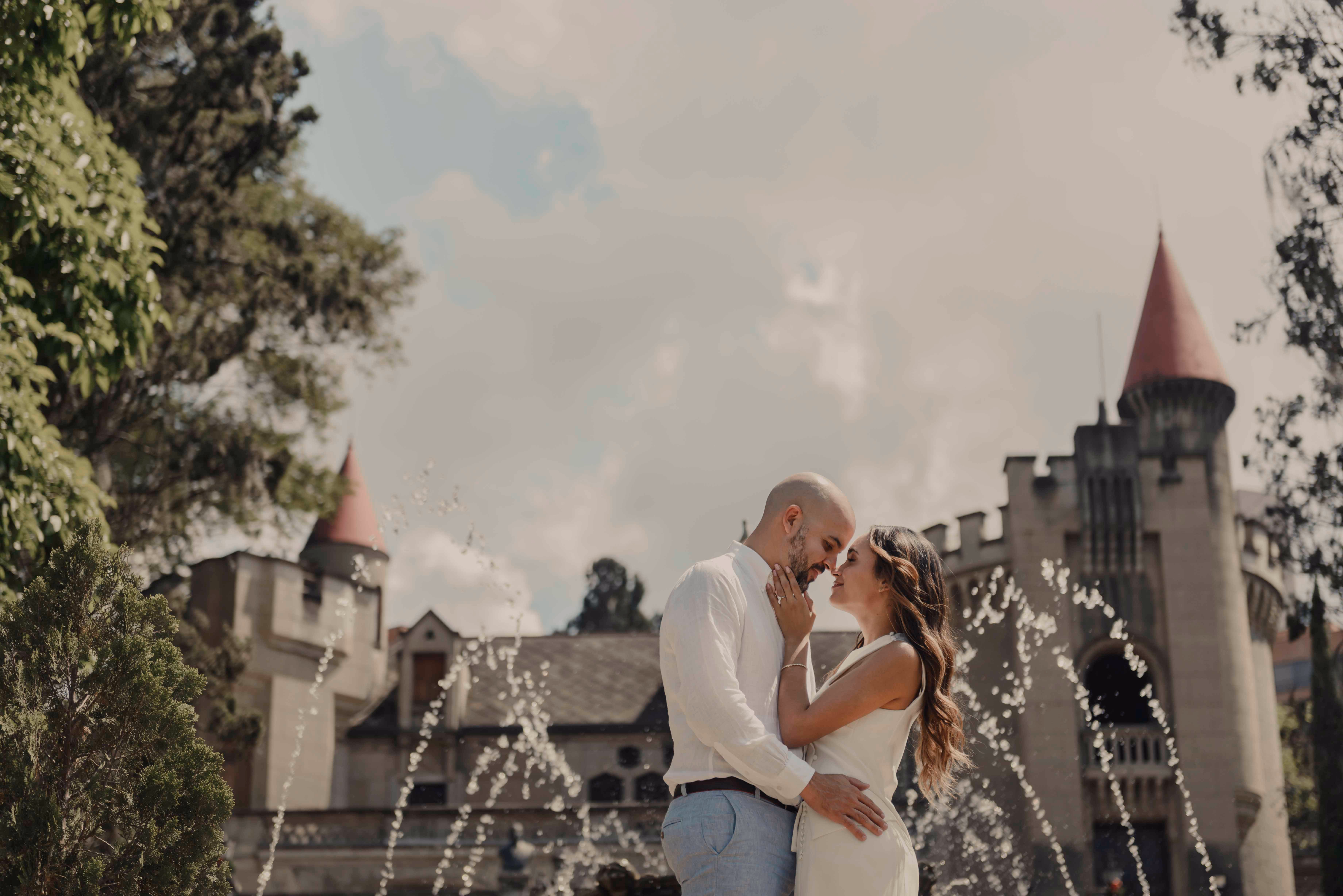 Couple during an engagement session in classical architecture